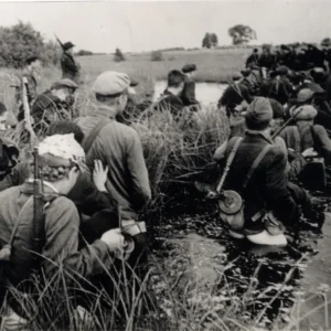A Soviet partisan unit fording a river