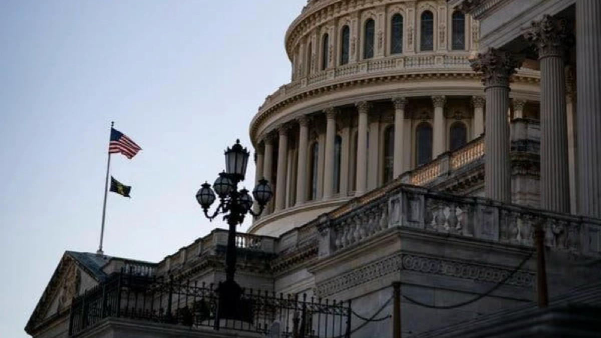 U.S. Capitol Building dome with American flag flying, Washington D.C.