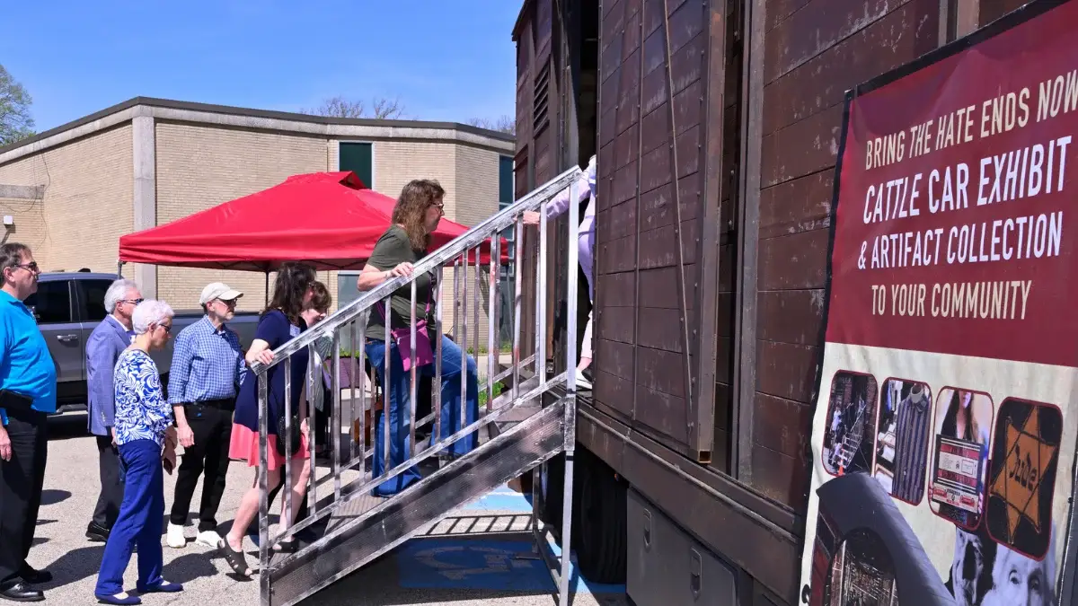 HAMEC Holocaust cattle car exhibit event banner